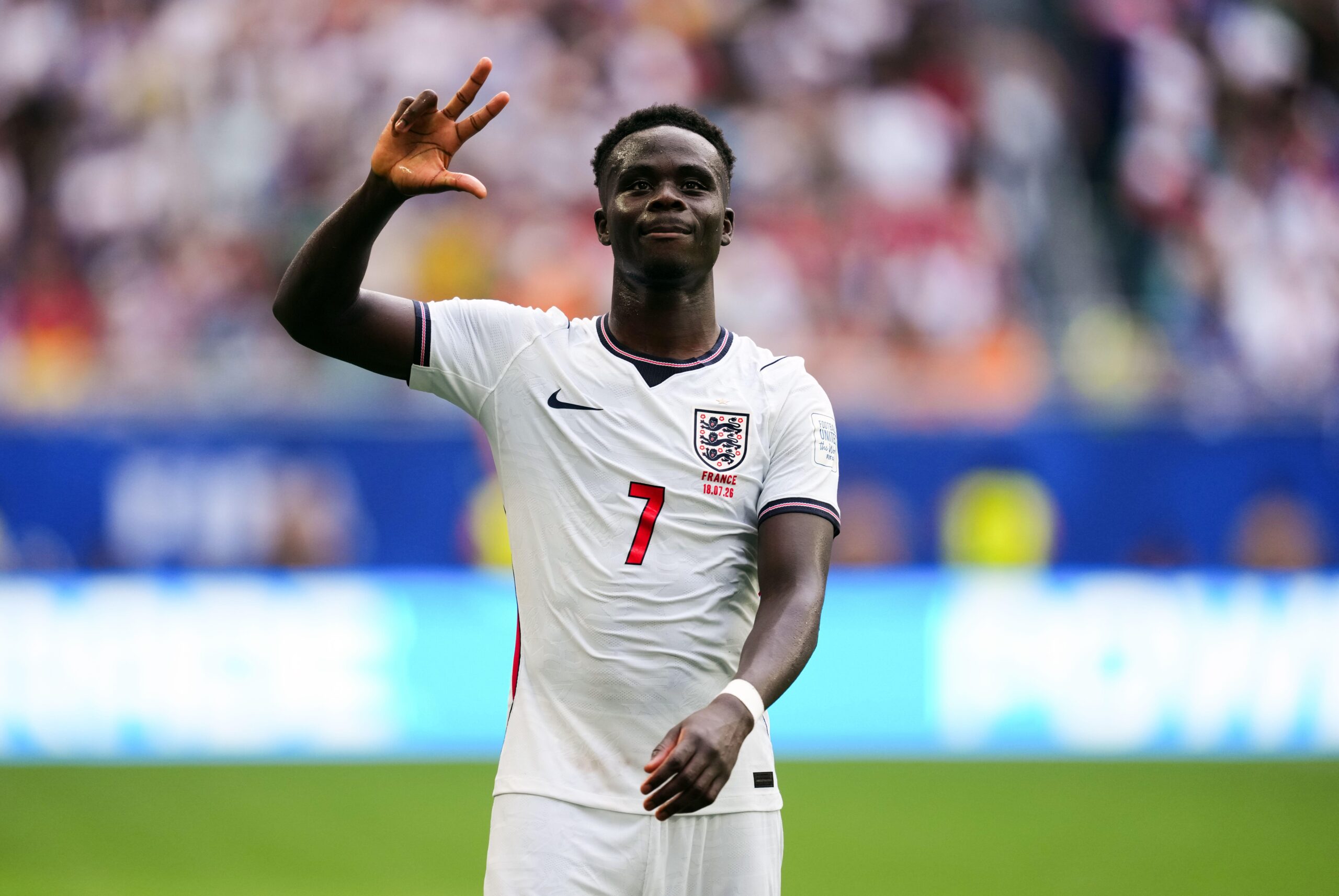 Bukayo Saka celebrating scoring a hat-trick for England